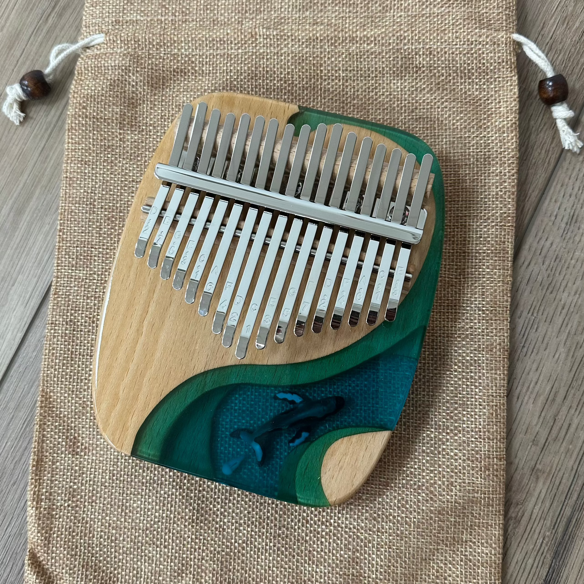 21-key kalimba in maple wood with Dolphin design